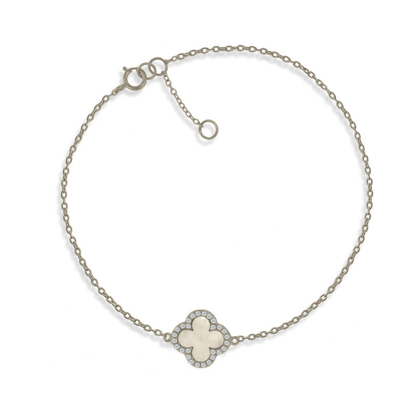 
Sterling silver chain bracelet with a Mother of Pearl clover charm rimmed with cubic zirconia stones, displayed  .

