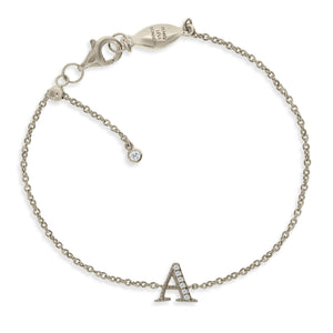 

Sterling silver chain initial bracelet with cubic zirconia and adjustable sliding size adapter.

