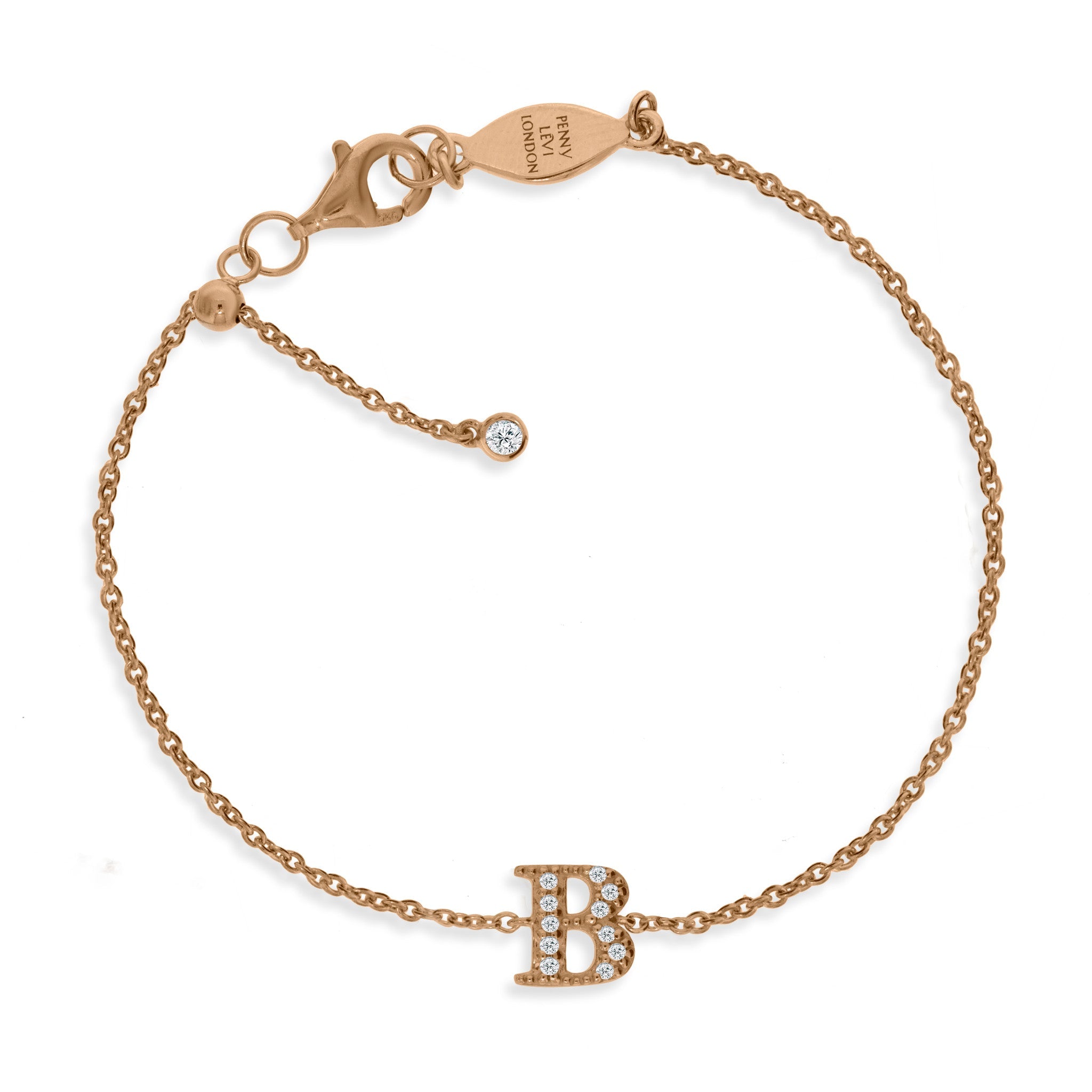 
Rose gold plated on silver chain initial B bracelet with cubic zirconia stones and sliding length adapter, showcasing a luxurious and adjustable fit.

