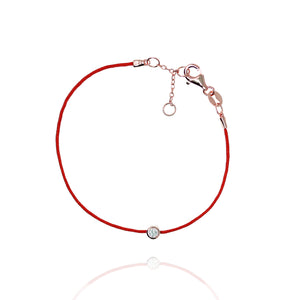 
Elegant gold plated on silver red string bracelet with small cubic zirconia.

