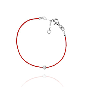 
Sterling silver red string bracelet with small cubic zirconia and lobster clasp.

