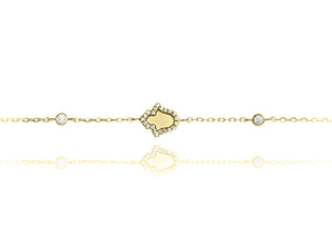 
Gold-plated sterling silver chain bracelet with mother of pearl Hamsa pendant, adorned with cubic zirconia, and two single bevel set CZ stones.

