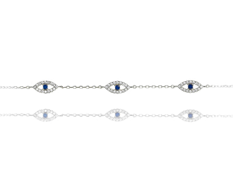 
Sterling silver chain bracelet with cubic zirconia evil eye design featuring blue centre stones.

