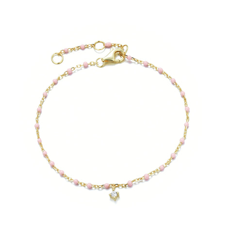 
Gold plated silver chain bracelet with baby pink enamel beads and a hanging CZ charm

