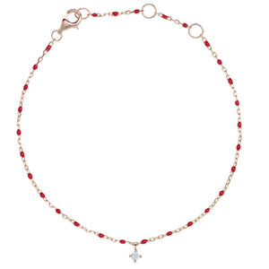 
Rose gold plated silver chain bracelet with red beads and hanging CZ charm

