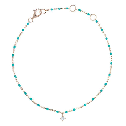 
Rose gold plated on silver chain and turquoise bead bracelet with hanging cubic zirconia charm

