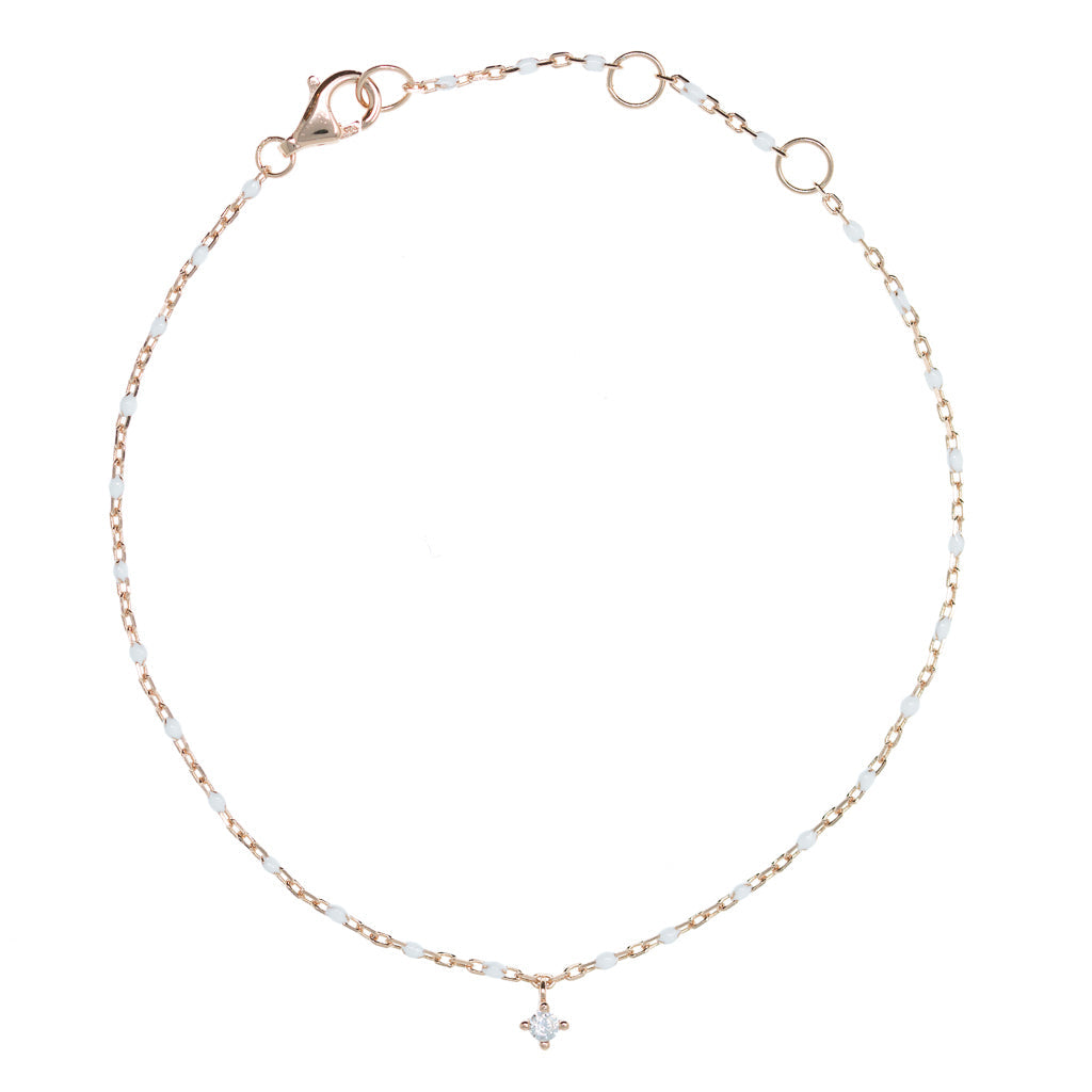 
Rose gold plated silver chain bracelet with white beads and hanging cubic zirconia

