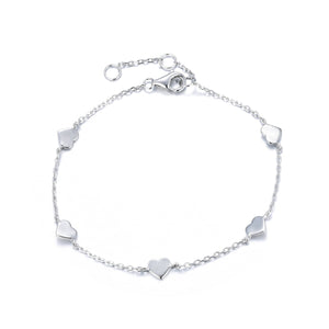 
Sterling silver chain and heart bracelet with five heart-shaped charms  .

