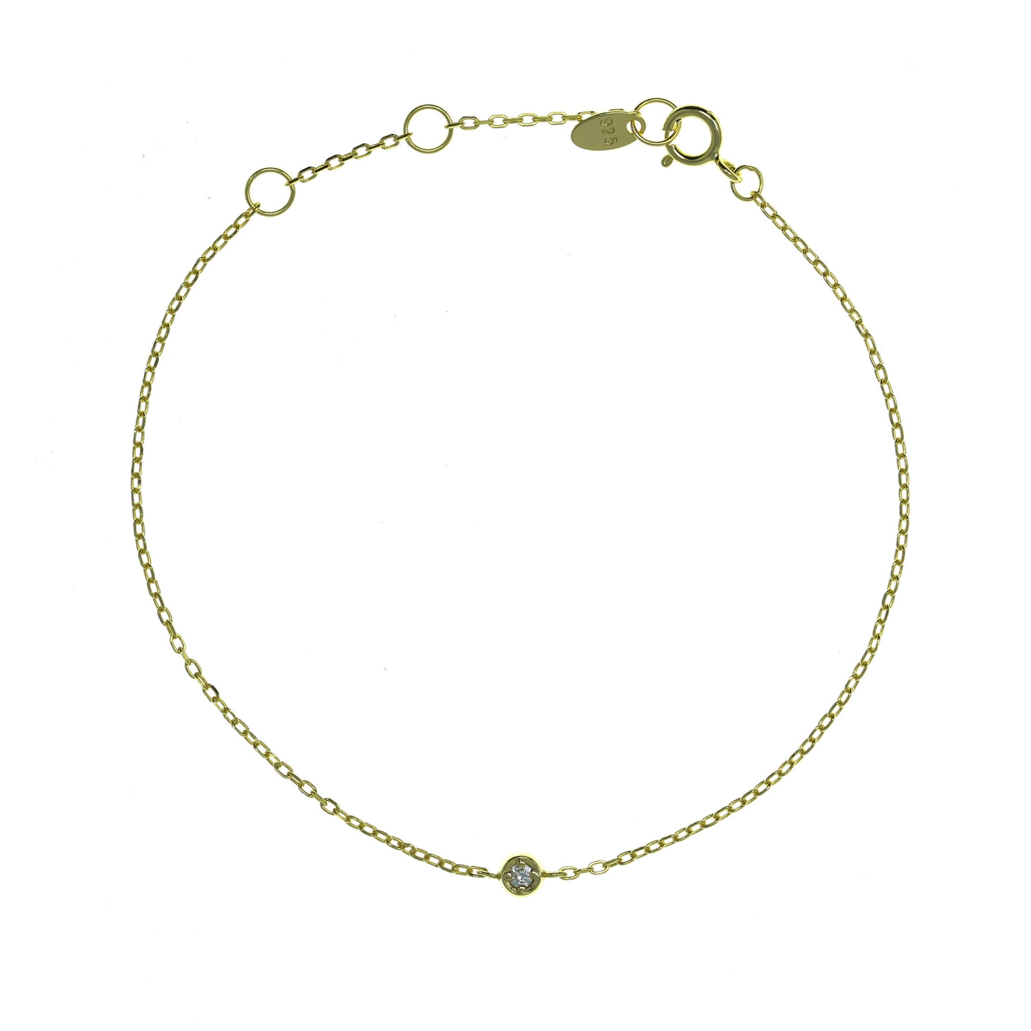 
Gold plated silver chain bracelet featuring a single cubic zirconia gemstone

