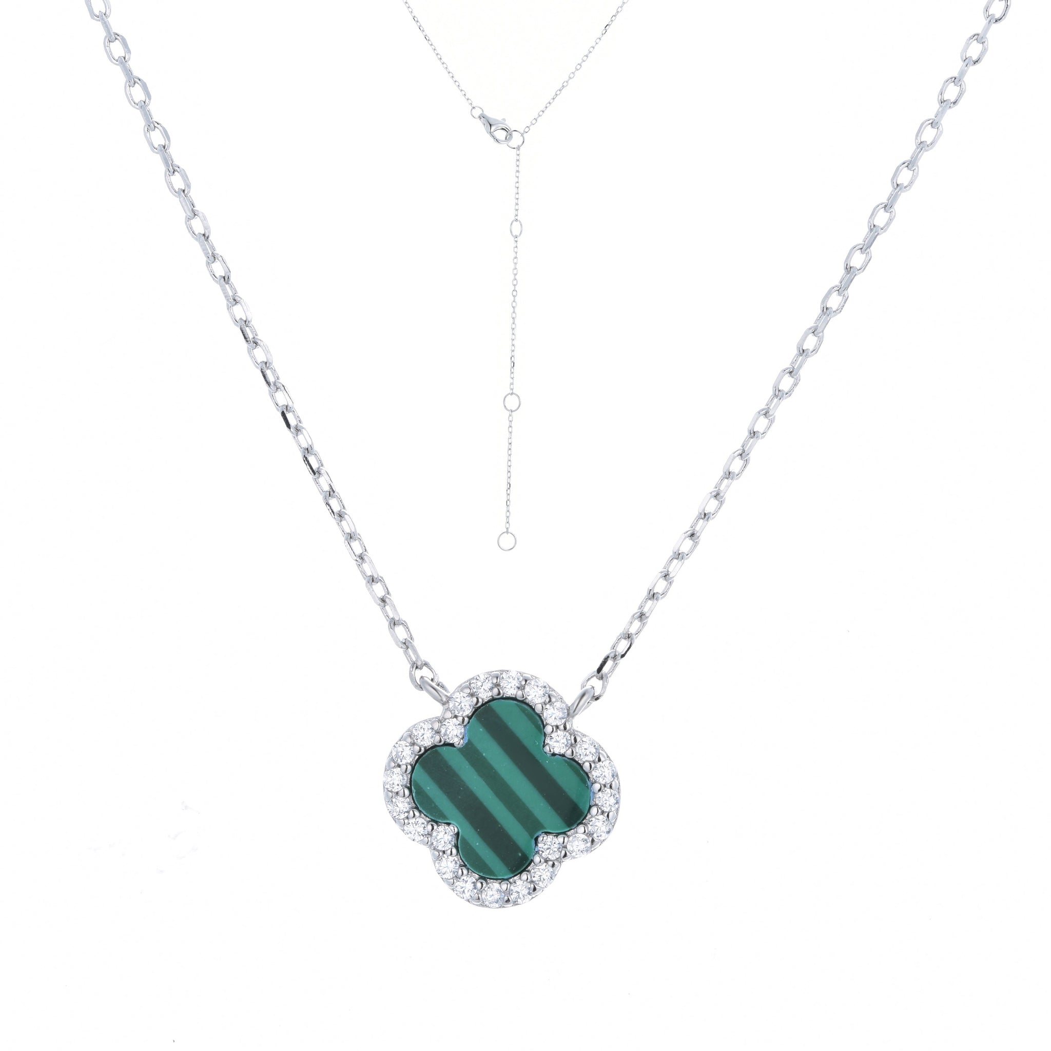 
Sterling Silver Malachite Clover Charm Necklace with white CZ rim on display.

