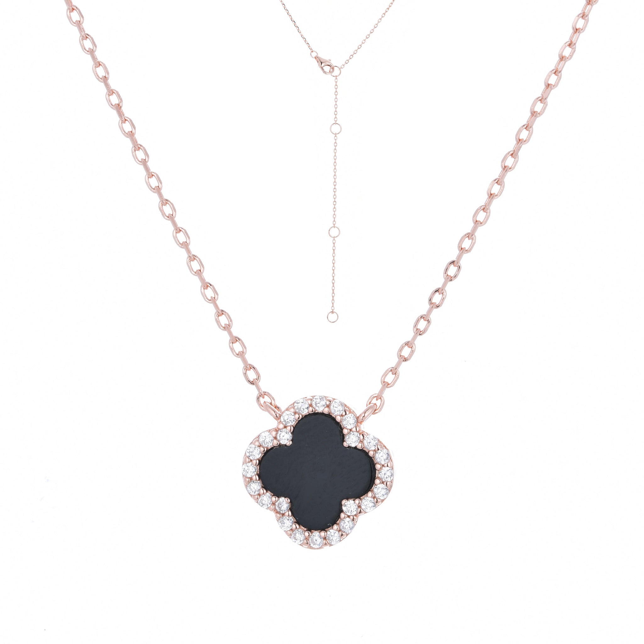 

Rose gold plated sterling silver necklace with a black onyx clover charm rimmed with white cubic zirconia stones.

