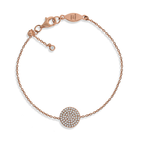 
Rose gold plated silver chain bracelet with pave disk and adjustable sliding ball mechanism.

