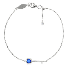 
Sterling Silver Chain Bracelet with Hexagon Blue Stone in Key Motif and Adjustable Ball Slider.

