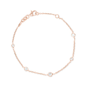 
Rose gold and silver chain bracelet with five bezel set Cubic Zirconia stones and lobster clasp.

