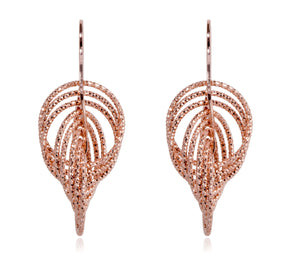 
Rose gold plated on silver large multi hoop intertwined diamond cut earrings, crafted in Italy with a diameter of 3.50 cm.

