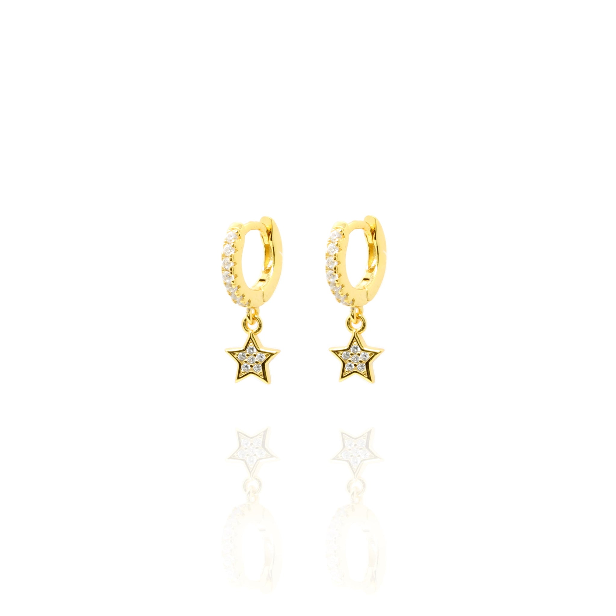 Gold plated on silver small huggie earrings rimmed with cubic zirconia and dangling star charm.

