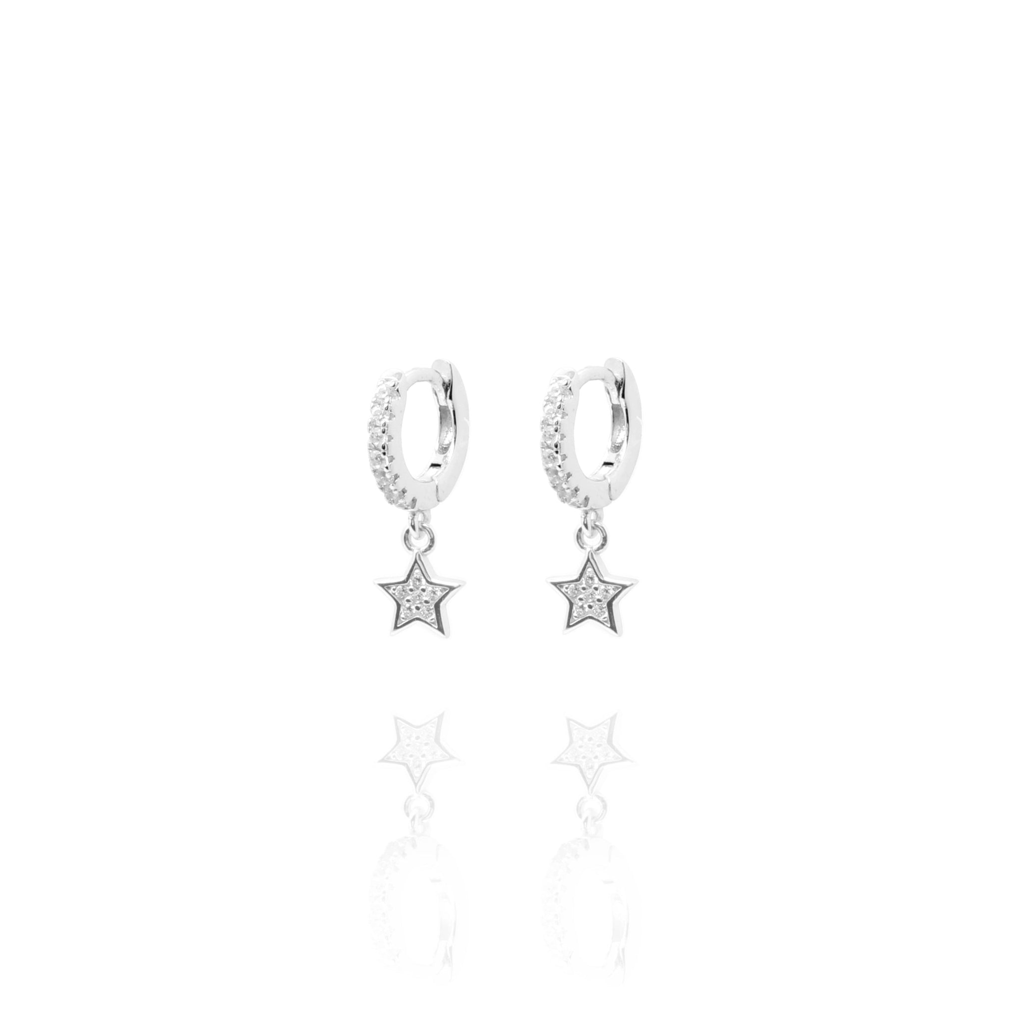 
Sterling silver huggie earrings with cubic zirconia and hanging star.

