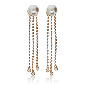 
Rose gold on silver pearl stud earrings with three hanging chains, each featuring a small cubic zirconia gemstone at the end. 

