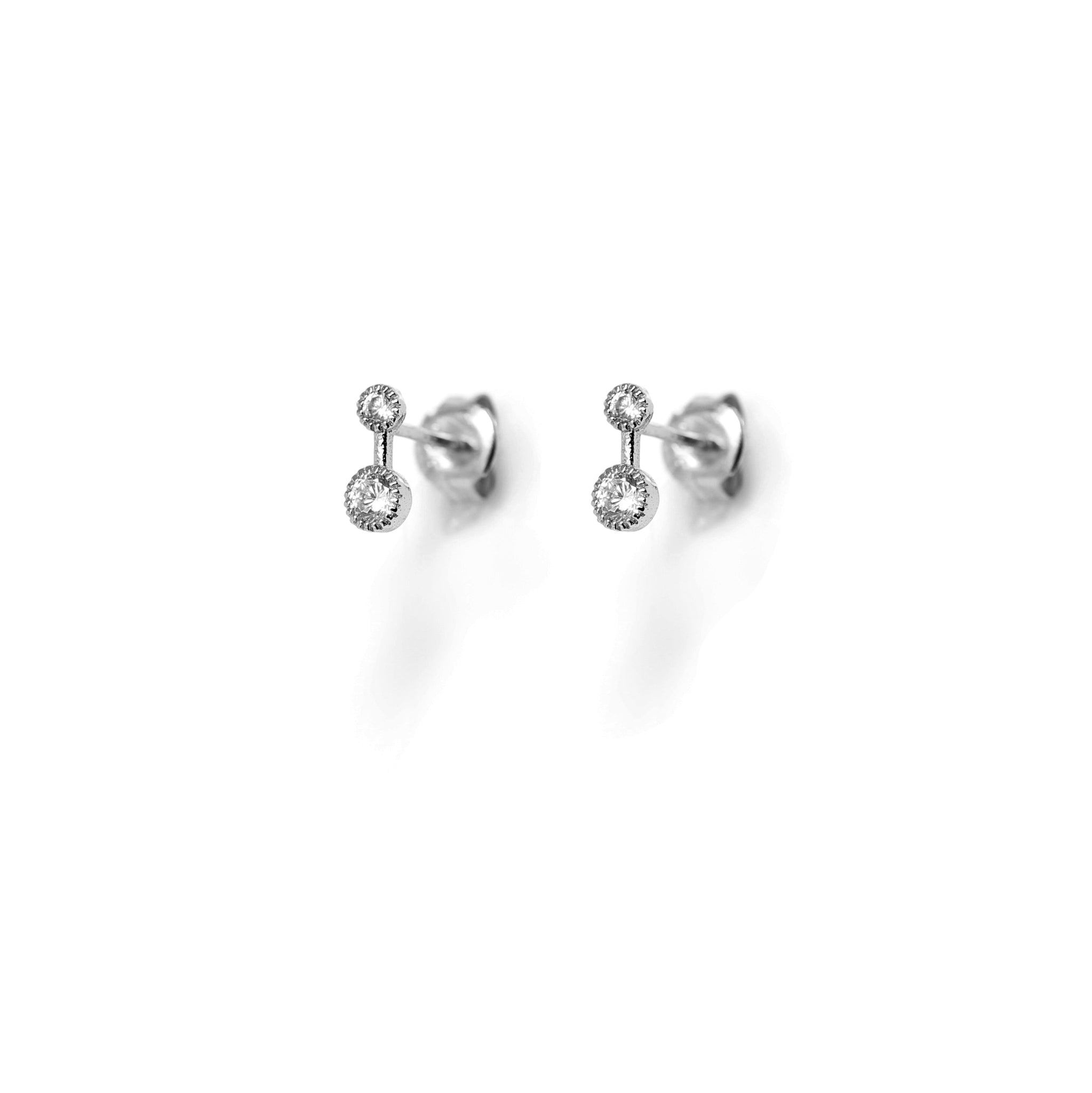 
Pair of sterling silver stud earrings with two cubic zirconia stones each.

