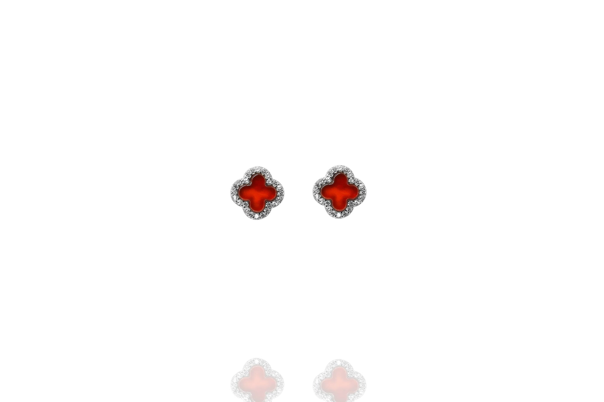 
Sterling silver earrings featuring red carnelian clover rimmed with white CZ.

