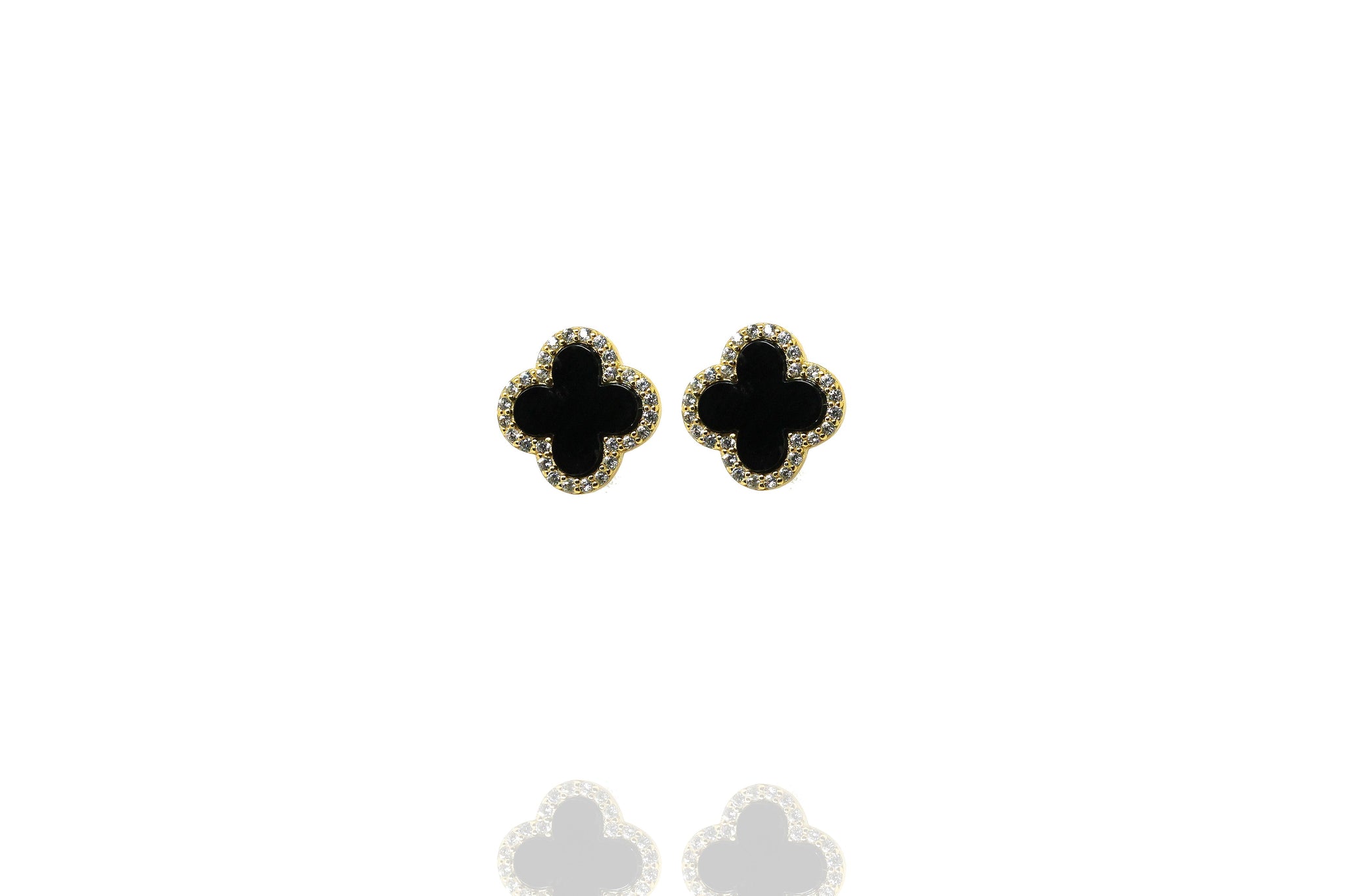 
Gold-plated silver earrings with large onyx stone and cubic zirconia accents in a clover shape.

