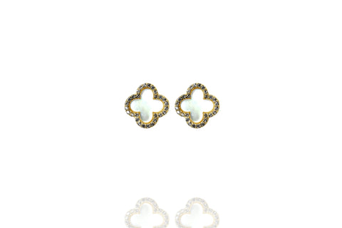 
Gold-plated silver Mother of Pearl clover stud earrings with cubic zirconia rim.

