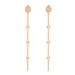 
Elegant rose gold teardrop earrings with pave Cubic Zirconia and hanging chain featuring beads.

