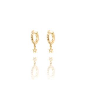 
A pair of gold-plated silver huggie earrings with tiny hanging stars set with cubic zirconia.

