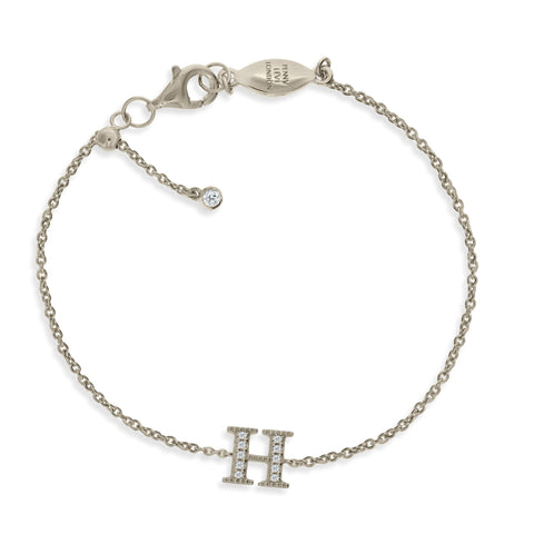 
Sterling silver chain initial bracelet with CZ featuring a sliding size adapter and an inset 'H' initial adorned with cubic zirconia stones.

