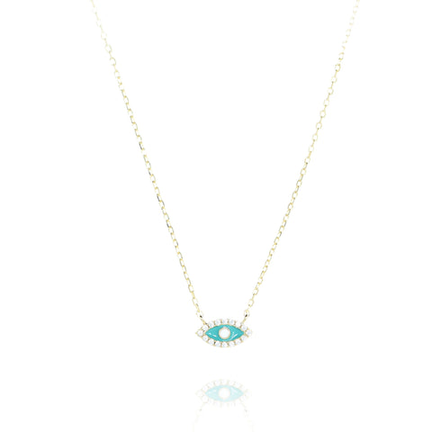 

Gold plated on silver turquoise evil eye pendant necklace rimmed with cubic zirconia.

