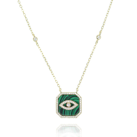 
Gold plated silver chain necklace with an evil eye on a green plaque and crystal accents

