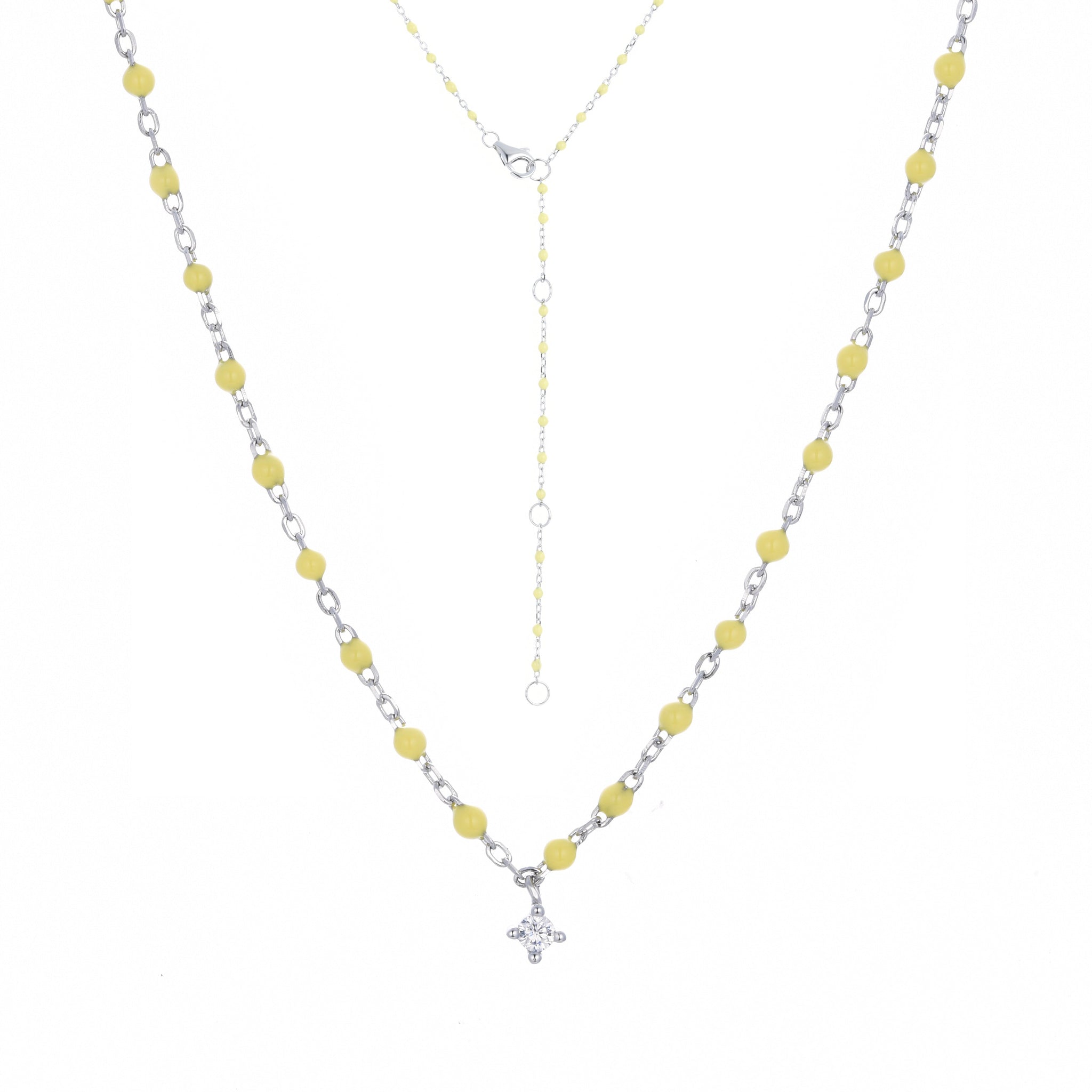 
Gold plated on silver necklace with yellow enamel beads and hanging cubic zirconia pendant.

