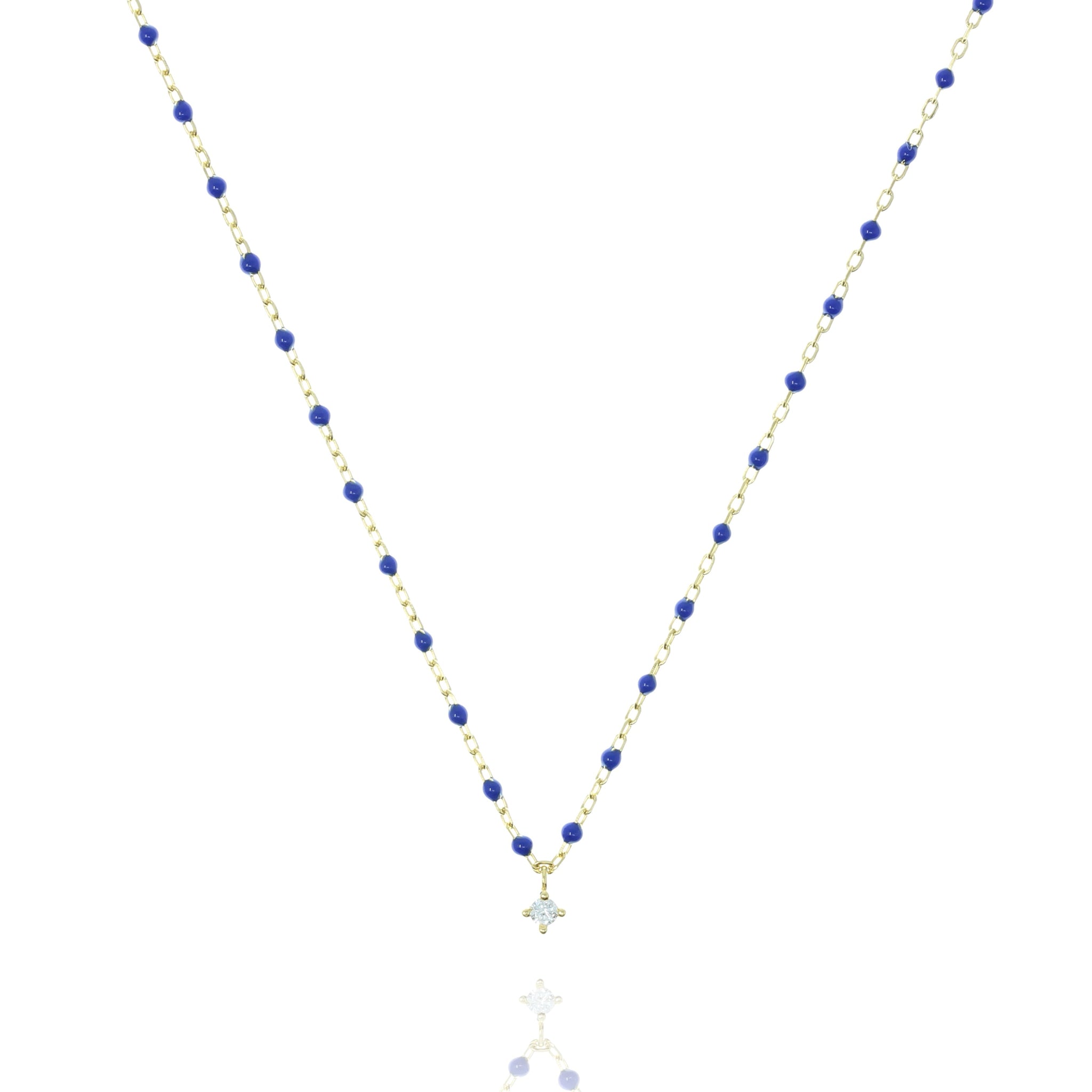 
Gold plated chain with blue beads and a small cubic zirconia pendant necklace

