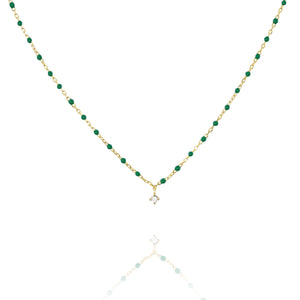 

Elegant short gold-plated necklace with green beads and a central Cubic Zirconia

