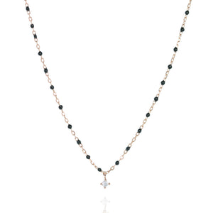 
Elegant rose gold plated silver necklace with black beads and central sparkling Cubic Zirconia.

