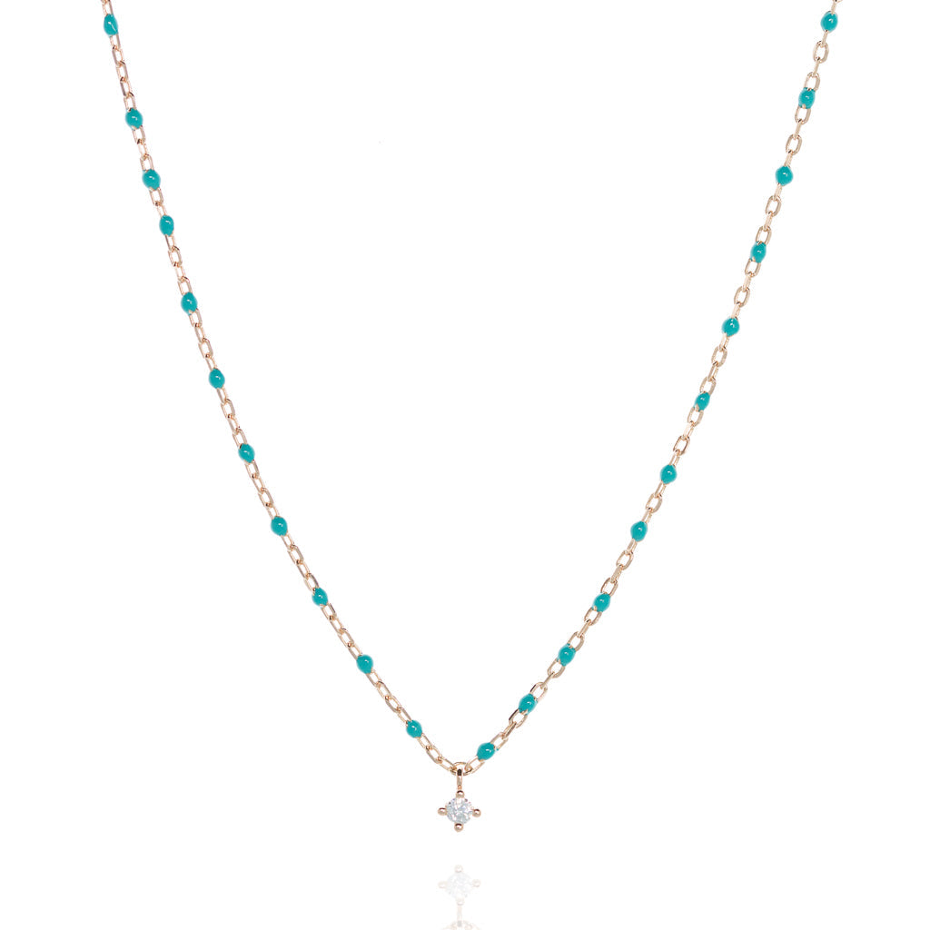 
Rose Gold Plated Chain and Bead Necklace with Turquoise Beads and Small Cubic Zirconia Centrepiece

