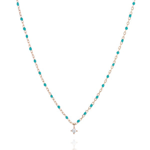 
Rose Gold Plated Chain and Bead Necklace with Turquoise Beads and Small Cubic Zirconia Centrepiece

