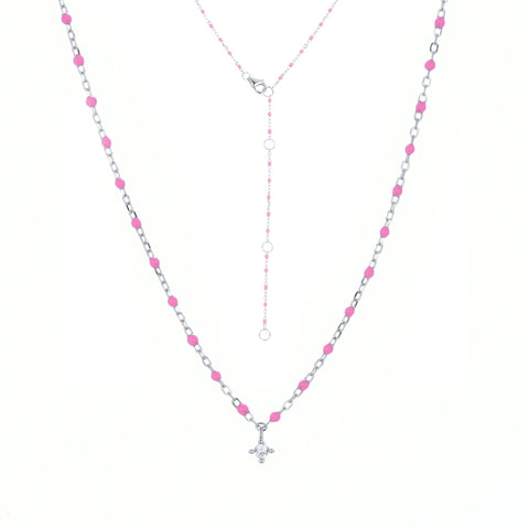 
Sterling silver chain and bead necklace with fuchsia coloured beads and a hanging cubic zirconia pendant.

