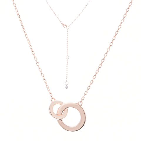 
Rose gold plated on silver intertwined circle necklace with an adjustable chain and lobster clasp.

