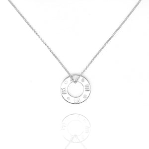 
Sterling silver necklace with hollow clock face pendant and cubic zirconia stones

