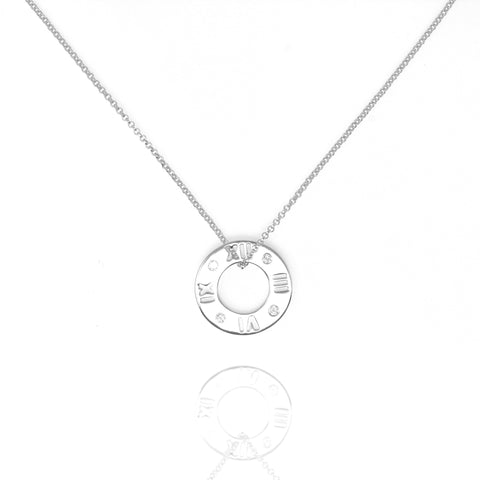 
Sterling silver necklace with hollow clock face pendant and cubic zirconia stones

