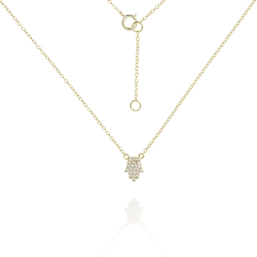 
Gold plated on silver chain bracelet with a pavé Hamsa charm, featuring an adjustable extension chain.

