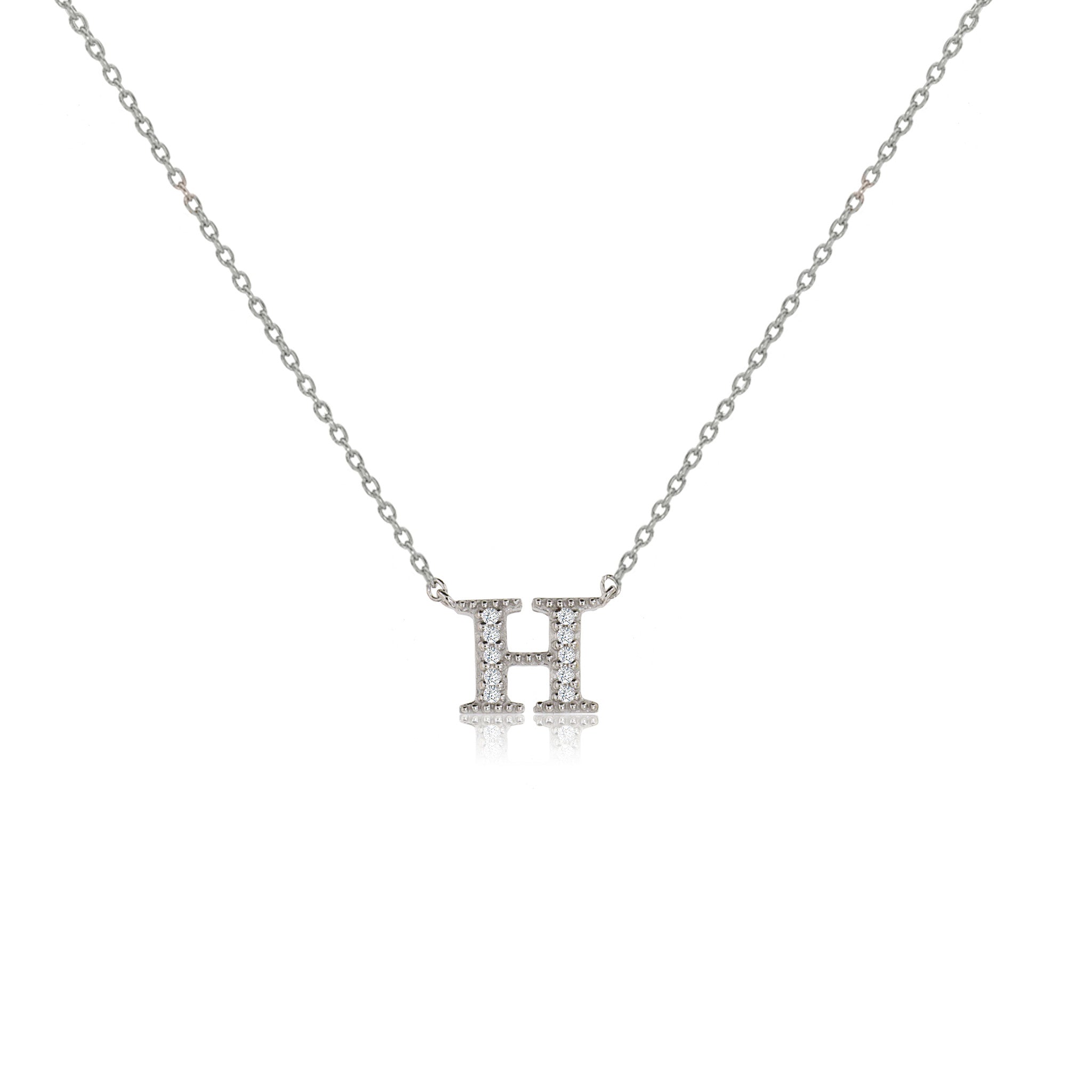 
Sterling silver initial necklace with cubic zirconia decoration on an adjustable chain.

