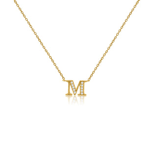 
Gold plated on silver initial necklace with CZ decoration, featuring an M pendant and a sliding length adjuster.

