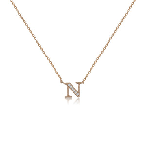 
Rose gold plated initial 'N' necklace with cubic zirconia decoration  .

