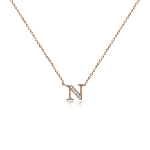 
Rose gold plated initial 'N' necklace with cubic zirconia decoration  .

