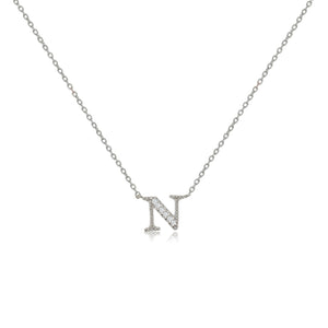 
Sterling silver initial necklace featuring an 'N' pendant decorated with cubic zirconia stones on an adjustable chain.

