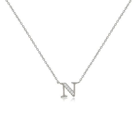 
Sterling silver initial necklace featuring an 'N' pendant decorated with cubic zirconia stones on an adjustable chain.

