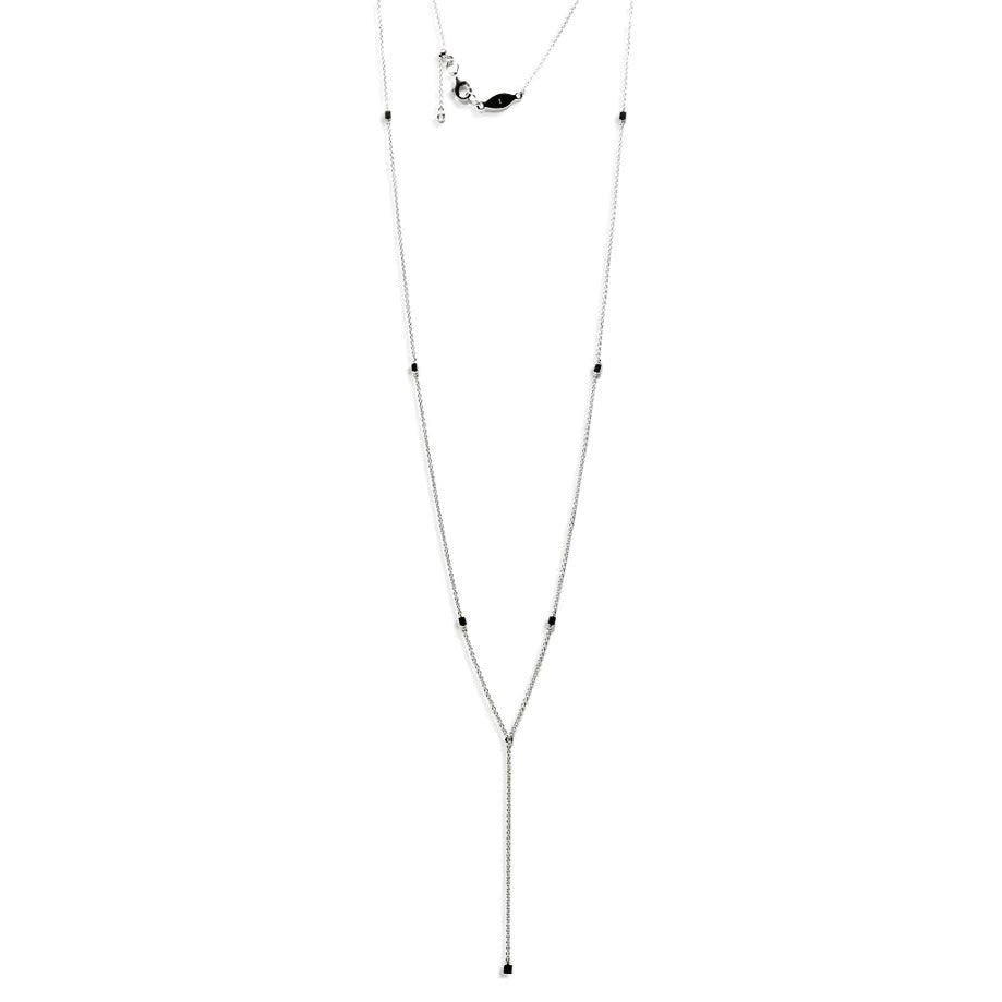 
Sterling silver necklace with black beads and adjustable length mechanism.

