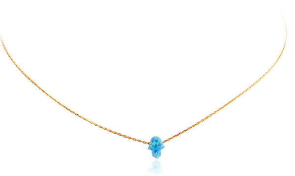 
Gold-plated silver chain necklace with blue opal Hamsa charm  .

